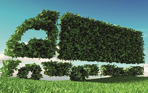 Eco friendly transportation concept. 3d rendering of green green truck icon on fresh spring meadow with blue sky in background.